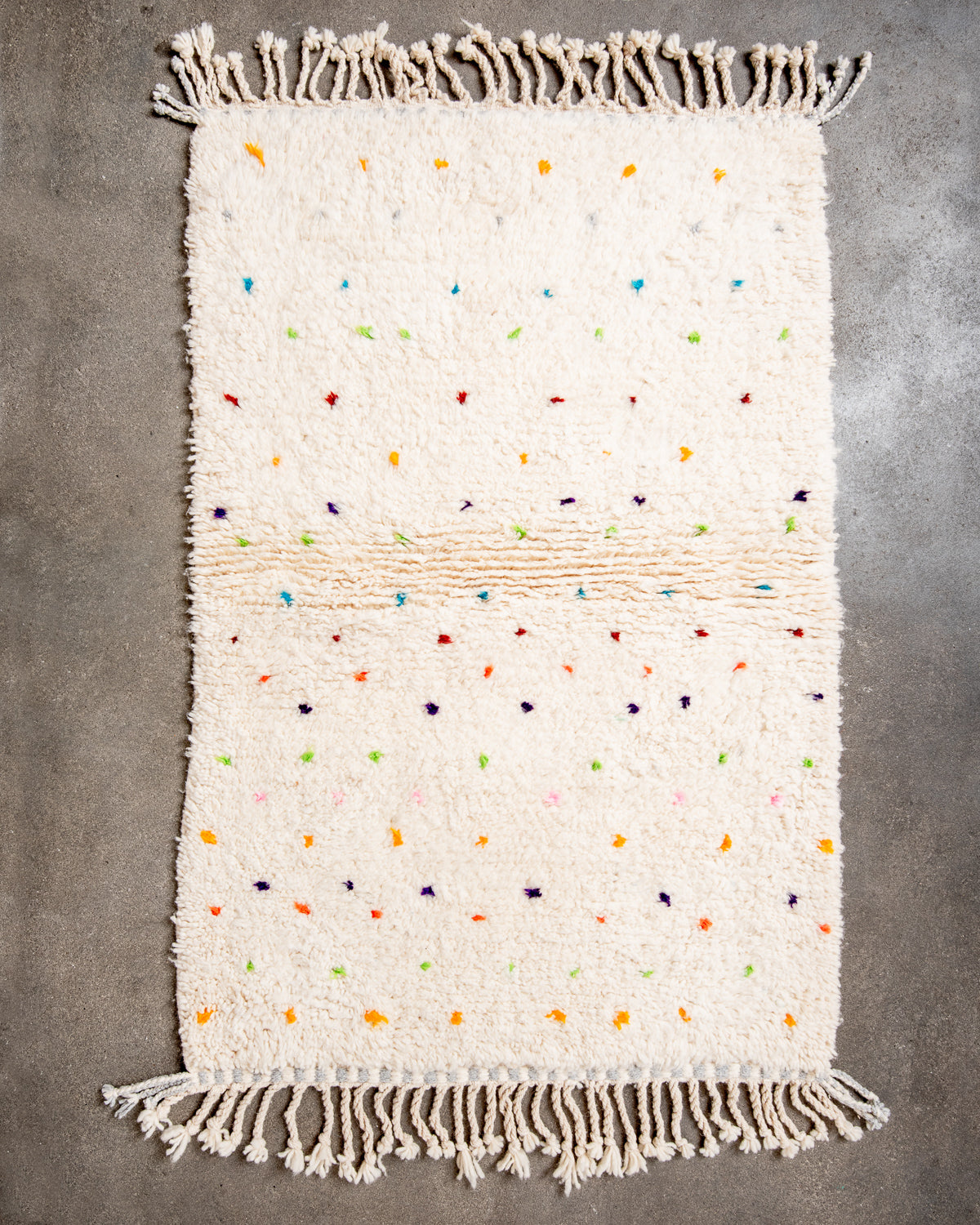 Modern, designer, handcrafted Berber rug from Morocco. Beniourain carpet with beautiful colours and patterns and fluffy wool texture.